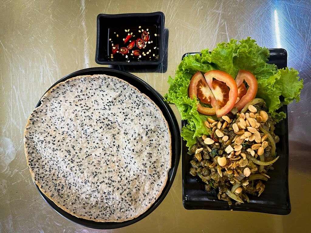 Savor Hue’s crispy rice cracker snack on a street food tour